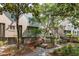 Attractive townhomes with well-kept landscaping and pathways through a wooded community at 3560 Shipwatch Rd, Kiawah Island, SC 29455
