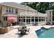 Elegant backyard featuring pool, patio, and covered porch at 3685 Colonel Vanderhorst Cir, Mount Pleasant, SC 29466