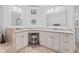 Bathroom vanity with double sinks, decorative mirror and neutral color scheme at 3685 Colonel Vanderhorst Cir, Mount Pleasant, SC 29466