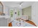 Adorable Bedroom with hardwood floors, a crib, and ample natural light for a cozy and inviting space at 3685 Colonel Vanderhorst Cir, Mount Pleasant, SC 29466