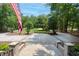 Expansive brick driveway leading to a well-manicured home, enhancing curb appeal at 3685 Colonel Vanderhorst Cir, Mount Pleasant, SC 29466