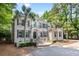 Beautiful brick house with a manicured lawn, mature trees, and a welcoming front porch at 3685 Colonel Vanderhorst Cir, Mount Pleasant, SC 29466