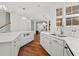 Bright kitchen boasts white cabinets, granite countertops, and stainless steel appliances at 3685 Colonel Vanderhorst Cir, Mount Pleasant, SC 29466