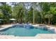 Beautiful backyard oasis with pool, spa, and lush landscaping at 3685 Colonel Vanderhorst Cir, Mount Pleasant, SC 29466