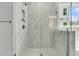 Elegant bathroom featuring a glass-enclosed shower with marble-style tile at 395 Wappoo Trace Ln, Summerville, SC 29486