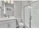 Clean bathroom with shower featuring a glass door and modern fixtures at 395 Wappoo Trace Ln, Summerville, SC 29486