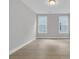 Bright, spacious bedroom featuring durable wood-look floors and lots of natural light at 395 Wappoo Trace Ln, Summerville, SC 29486