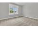 Bright bedroom with large windows offering natural light and neutral carpeting throughout at 395 Wappoo Trace Ln, Summerville, SC 29486