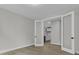 Versatile bonus room showcasing double glass doors and durable wood-look floors at 395 Wappoo Trace Ln, Summerville, SC 29486