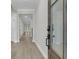 Inviting foyer featuring wood-look floors and a glass-paneled front door at 395 Wappoo Trace Ln, Summerville, SC 29486