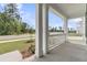 Charming front porch with beautiful columns and lovely landscaping at 395 Wappoo Trace Ln, Summerville, SC 29486