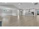 Spacious living room open to a modern kitchen featuring hardwood floors and bright, neutral paint at 395 Wappoo Trace Ln, Summerville, SC 29486
