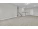Spacious loft area with neutral carpet and access to multiple rooms at 395 Wappoo Trace Ln, Summerville, SC 29486