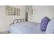 Cozy bedroom features an accent wall mirror design and comfortable bedding at 432 Caledon Ct, Johns Island, SC 29455
