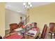 Dining room featuring wood table with seating for eight and stairway access at 466 Gianna Ln, Goose Creek, SC 29445