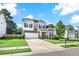 Beautiful two-story home featuring a well-maintained lawn and attached two-car garage at 466 Gianna Ln, Goose Creek, SC 29445