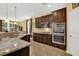 Beautiful kitchen with stainless steel appliances, dark cabinetry, and granite countertops at 466 Gianna Ln, Goose Creek, SC 29445