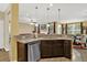 Open kitchen featuring granite counters, stainless dishwasher and view to dining and living areas at 466 Gianna Ln, Goose Creek, SC 29445