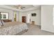 Bright main bedroom featuring tray ceiling and plenty of natural light at 466 Gianna Ln, Goose Creek, SC 29445