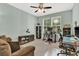 Comfortable home office with natural light, neutral walls and ceiling fan at 466 Gianna Ln, Goose Creek, SC 29445