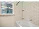 Bathroom featuring subway tile surround and a window for natural light at 4729 Lang Ridge Dr, North Charleston, SC 29405