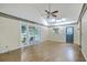 Expansive bonus room features hardwood floors, a ceiling fan, a skylight, and access to the porch at 4729 Lang Ridge Dr, North Charleston, SC 29405