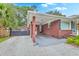 Brick carport featuring classic architectural details and ample parking space at 4729 Lang Ridge Dr, North Charleston, SC 29405