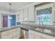 Bright kitchen showcasing granite countertops and stainless steel appliances under ample lighting at 4729 Lang Ridge Dr, North Charleston, SC 29405
