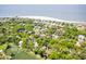 Stunning aerial view of homes nestled among trees near the Atlantic Ocean at 491 Sea Cloud Cir, Edisto Island, SC 29438