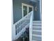 Close-up of the welcoming front entrance and steps of this delightful home at 491 Sea Cloud Cir, Edisto Island, SC 29438