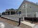 Inviting exterior of Pro Consignment, with a ramp and outdoor seating at 491 Sea Cloud Cir, Edisto Island, SC 29438