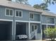Charming two-story condo with a covered parking area and inviting front entrance at 491 Sea Cloud Cir, Edisto Island, SC 29438