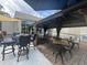 Relaxing outdoor patio seating area with tables and a gazebo at 491 Sea Cloud Cir, Edisto Island, SC 29438