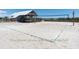 Beachfront cabana with beach volleyball setup, ideal for outdoor activities and beachfront fun at 491 Sea Cloud Cir, Edisto Island, SC 29438