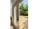 View from the door onto a cozy backyard deck and a glimpse of the green yard at 499 Lackland Ct, Mount Pleasant, SC 29464
