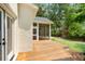 Beautiful wooden deck with view of backyard and screened in porch at 499 Lackland Ct, Mount Pleasant, SC 29464