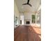 Beautiful covered patio with fireplace and ceiling fan for outdoor relaxation at 499 Lackland Ct, Mount Pleasant, SC 29464