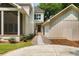 Exterior side view of house with screened porch and detached garage at 499 Lackland Ct, Mount Pleasant, SC 29464