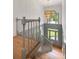 Grand foyer showcasing a hanging chandelier and a gray paneled staircase leading to the main floor at 499 Lackland Ct, Mount Pleasant, SC 29464