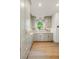 Kitchen with custom cabinets, marble countertops, and hardwood floors at 499 Lackland Ct, Mount Pleasant, SC 29464