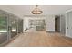 Spacious living room with hardwood floors that connects seamlessly to the gourmet kitchen at 499 Lackland Ct, Mount Pleasant, SC 29464