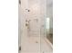 Modern tiled shower with glass partition and brushed gold fixtures at 499 Lackland Ct, Mount Pleasant, SC 29464