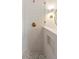 Shower with white subway tile walls, herringbone flooring, and gold fixtures at 499 Lackland Ct, Mount Pleasant, SC 29464