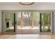 Living room with sliding glass doors that open to a beautiful backyard deck at 499 Lackland Ct, Mount Pleasant, SC 29464