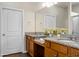 Bathroom featuring double sinks, granite countertops, and ample cabinet space at 505 Eastern Isle Ave, Summerville, SC 29486