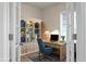 Cozy home office with built-in bookcase, desk, and large window for ample natural light at 505 Eastern Isle Ave, Summerville, SC 29486