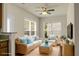 Bright living room featuring neutral walls, wicker furniture, and windows with lots of natural light at 505 Eastern Isle Ave, Summerville, SC 29486