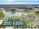 Aerial view of community with tennis courts and swimming pool at 516 Tidewater Chase Ln, Summerville, SC 29486