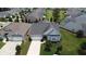 Drone shot of the house with a pristine lawn, showcasing curb appeal in a vibrant community at 516 Tidewater Chase Ln, Summerville, SC 29486