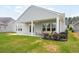 Beautiful backyard with covered patio, offering an ideal space for outdoor relaxation and entertainment at 516 Tidewater Chase Ln, Summerville, SC 29486